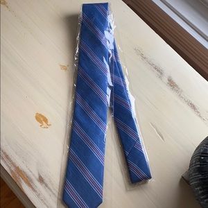 Blue with faint gray and red/rust stripe tie